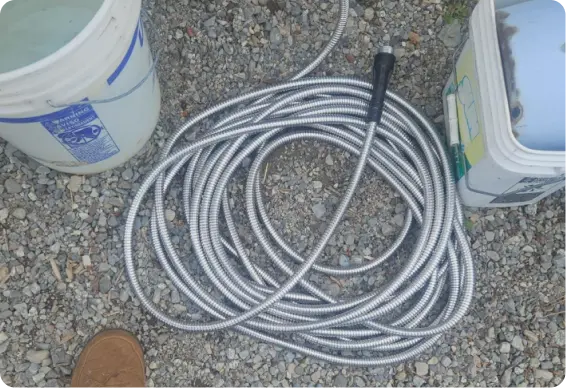 Garden sprinkler on dry ground