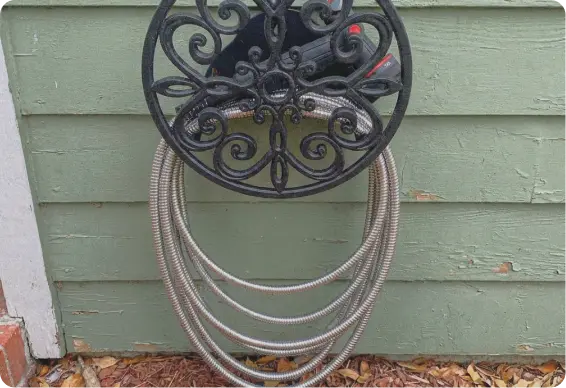 Sprinkler watering a backyard lawn