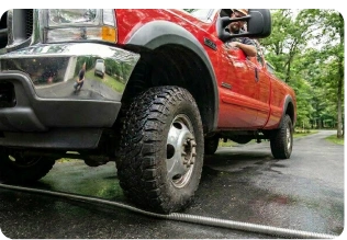 Quick-connect garden hose adapter attached to sprinkler